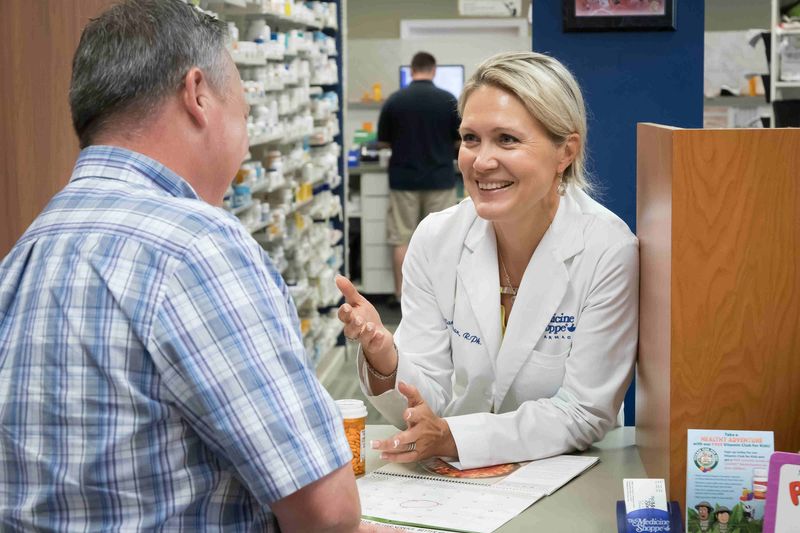 Lambertville Medicine Shoppe pharmacist helping a customer